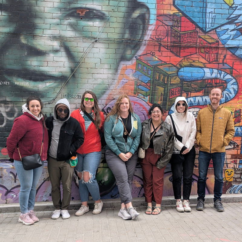 Netalico Team in front of graffiti