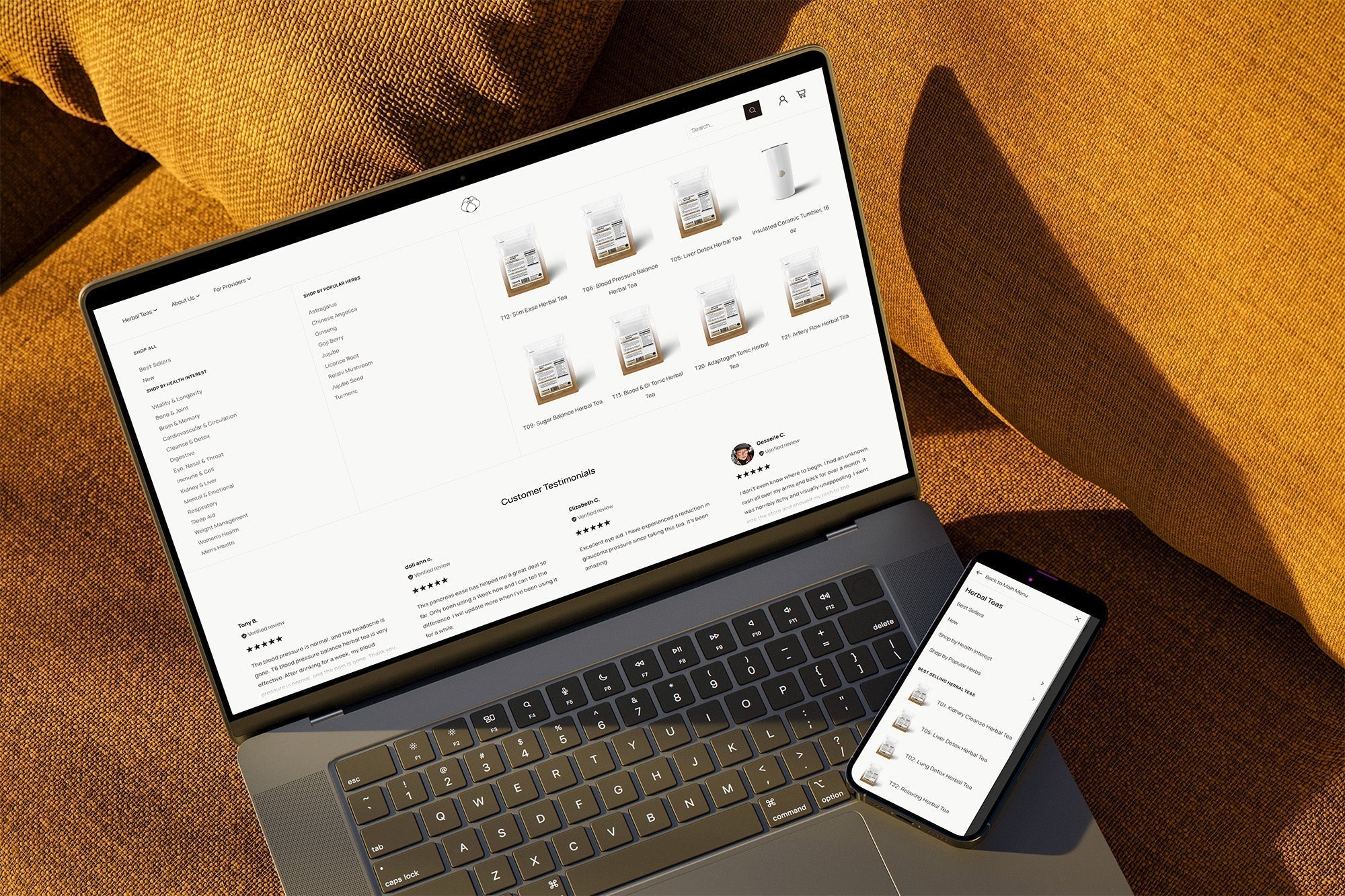 Laptop and smartphone showing Arcane Herb product listings, menu with 'Herbal Teas' and site section 'Customer Testimonials'