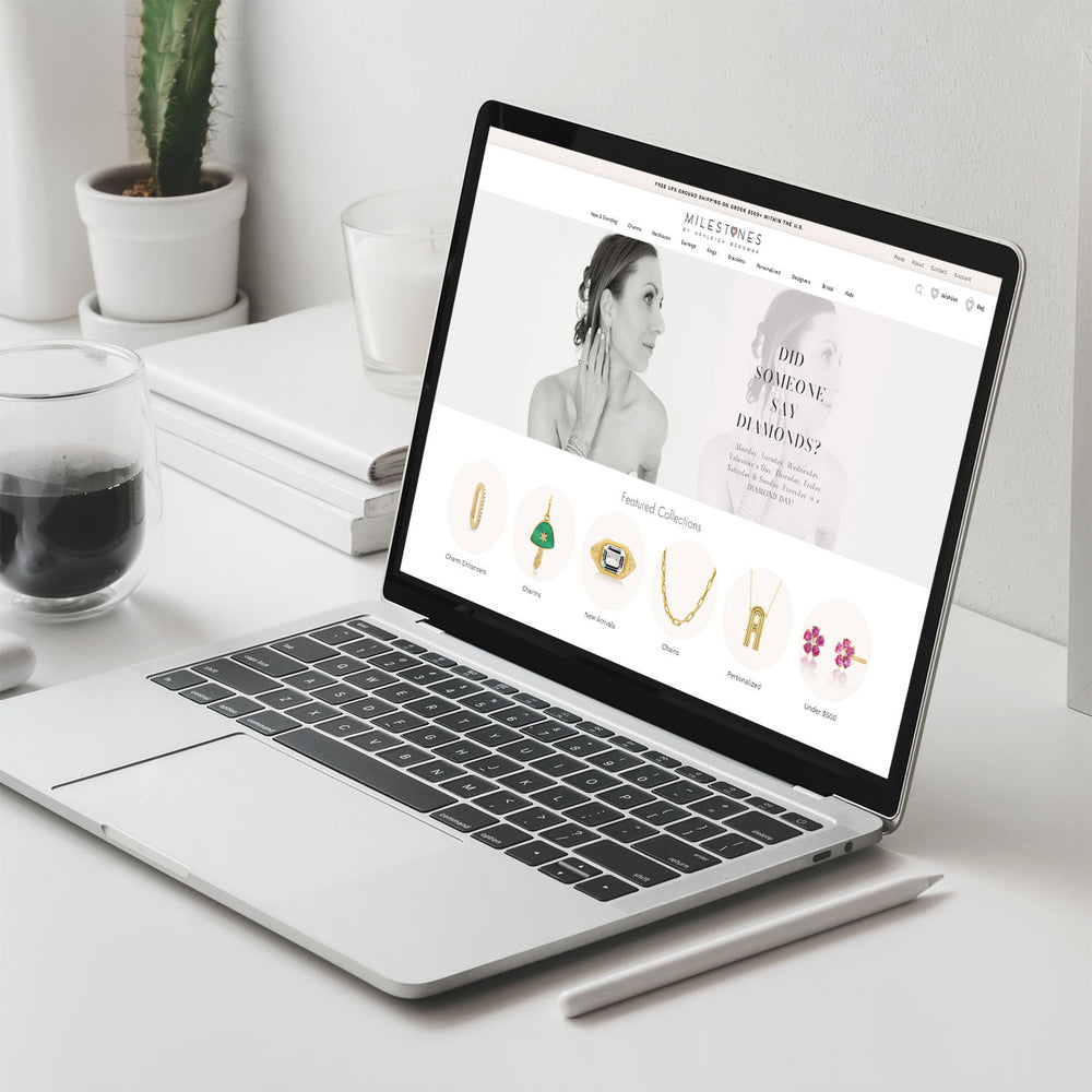 Milestones jewelry store built on Shopify by Netalico, shown on a laptop